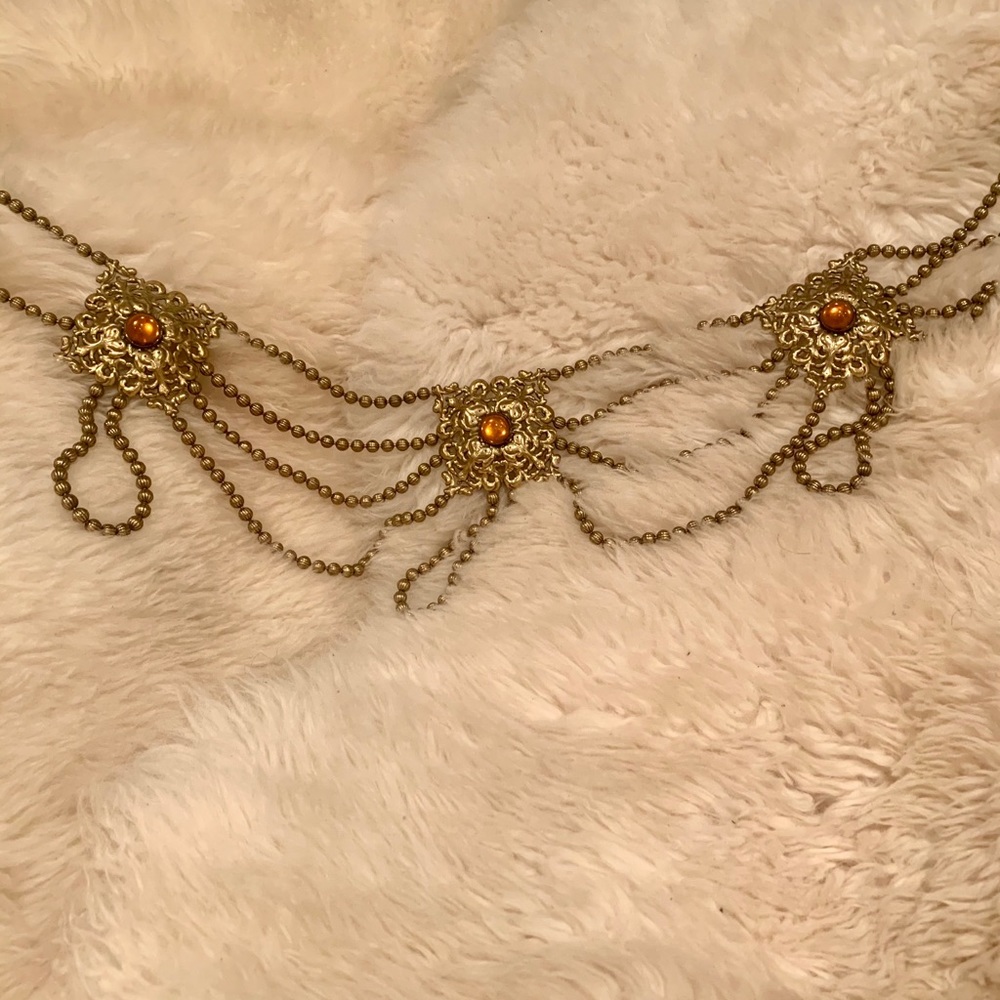 Amazing flattering vintage belt with orange detail